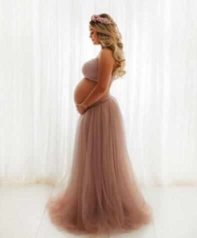 Megan Davison flaunting her baby bumps.